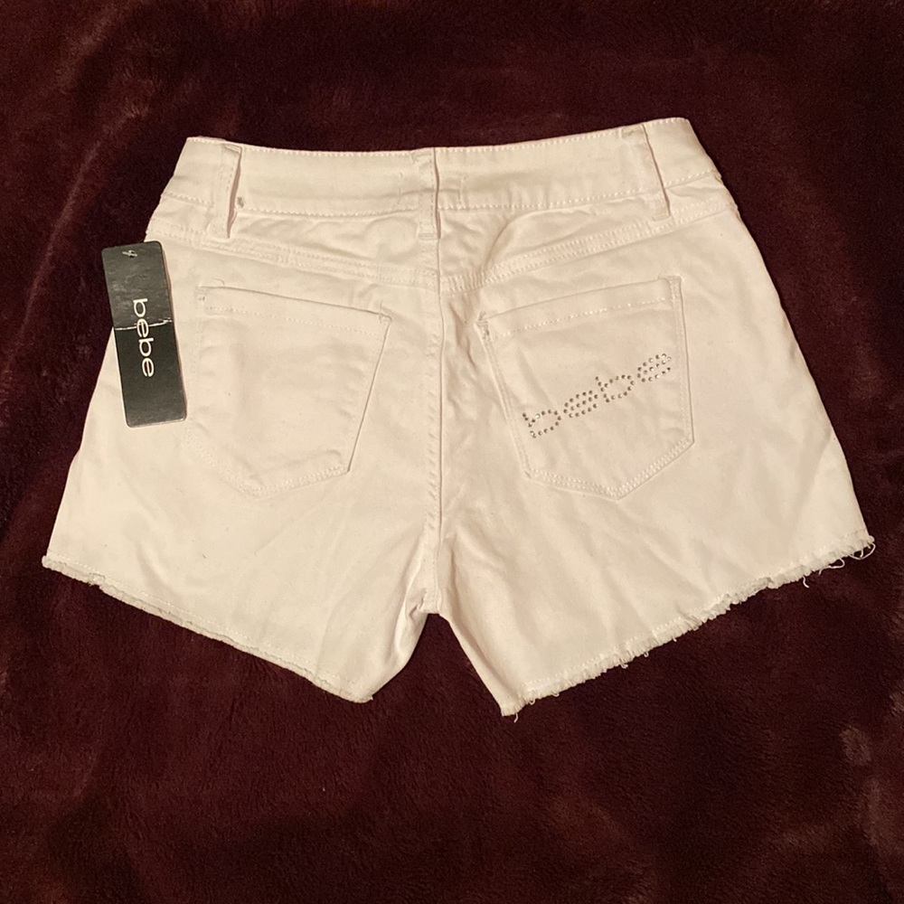 Bebe white shorts with embellishment on back pocket New